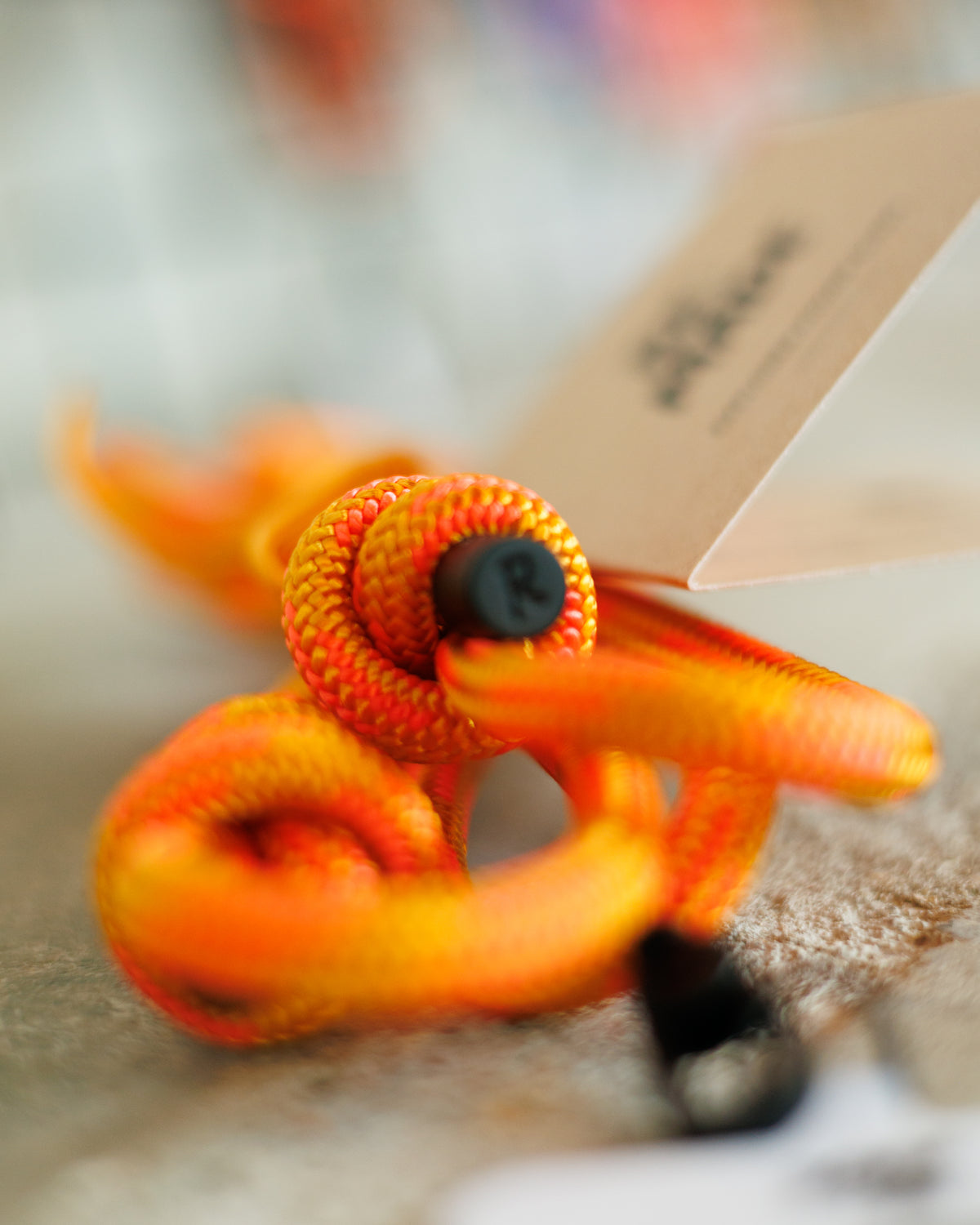 Solstice Orange crossbody phone sling by Re:Made, handmade from Mammut climbing cord, additional product view