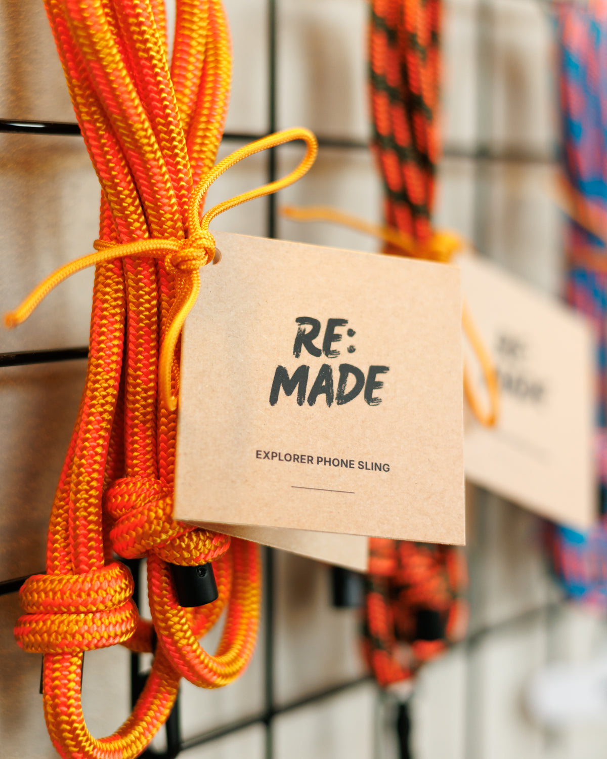 Solstice Orange crossbody phone sling by Re:Made, handmade from Mammut climbing cord, additional product view