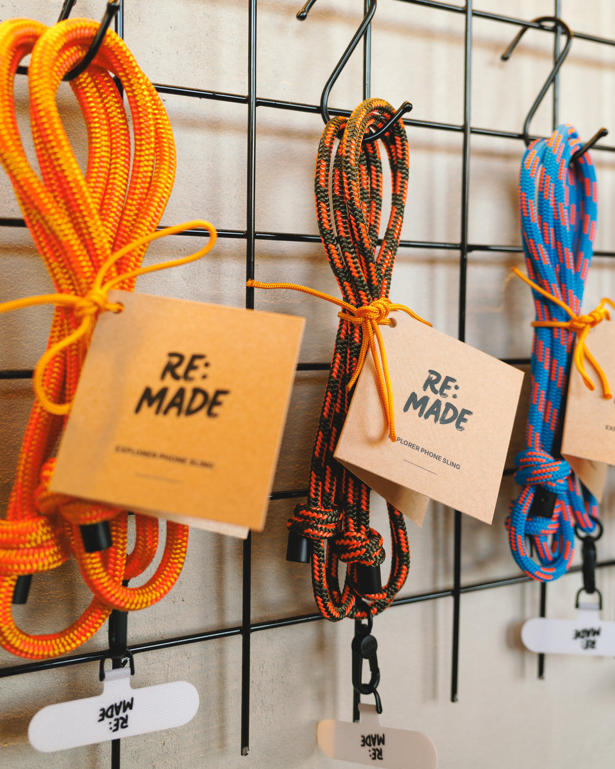 Solstice Orange crossbody phone sling by Re:Made, handmade from Mammut climbing cord, additional product view