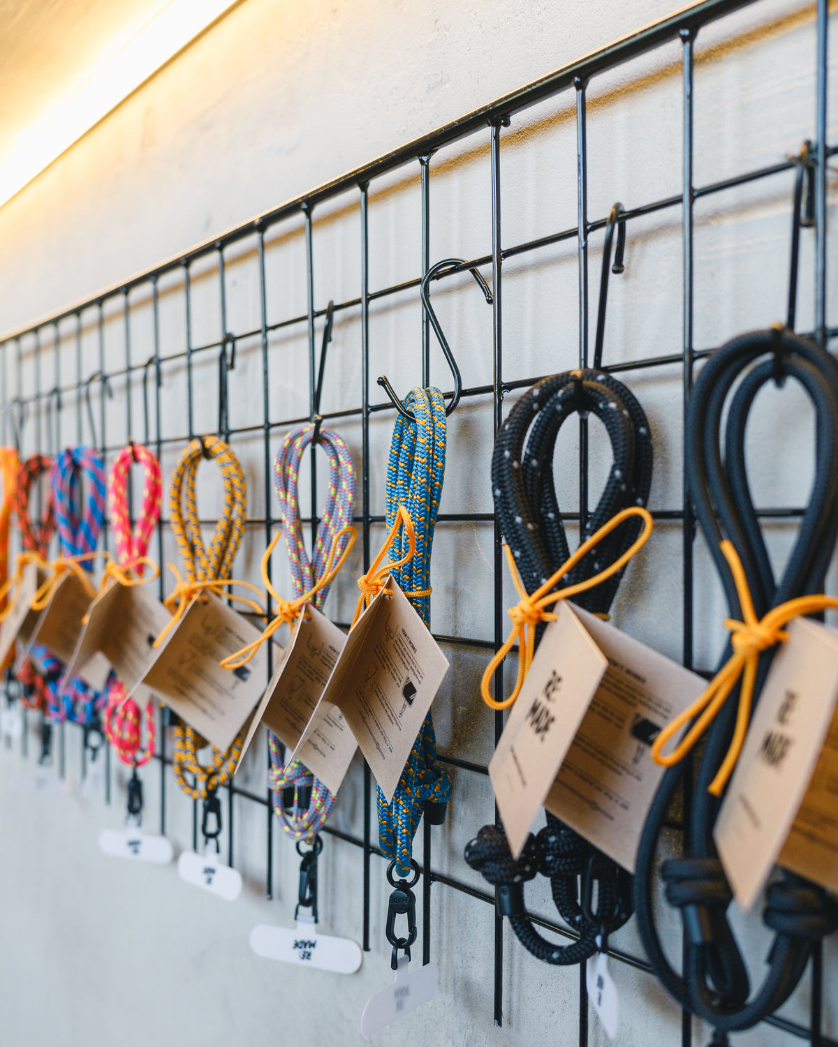 Black crossbody phone sling by Re:Made, handmade from Edelrid climbing cord, additional product view